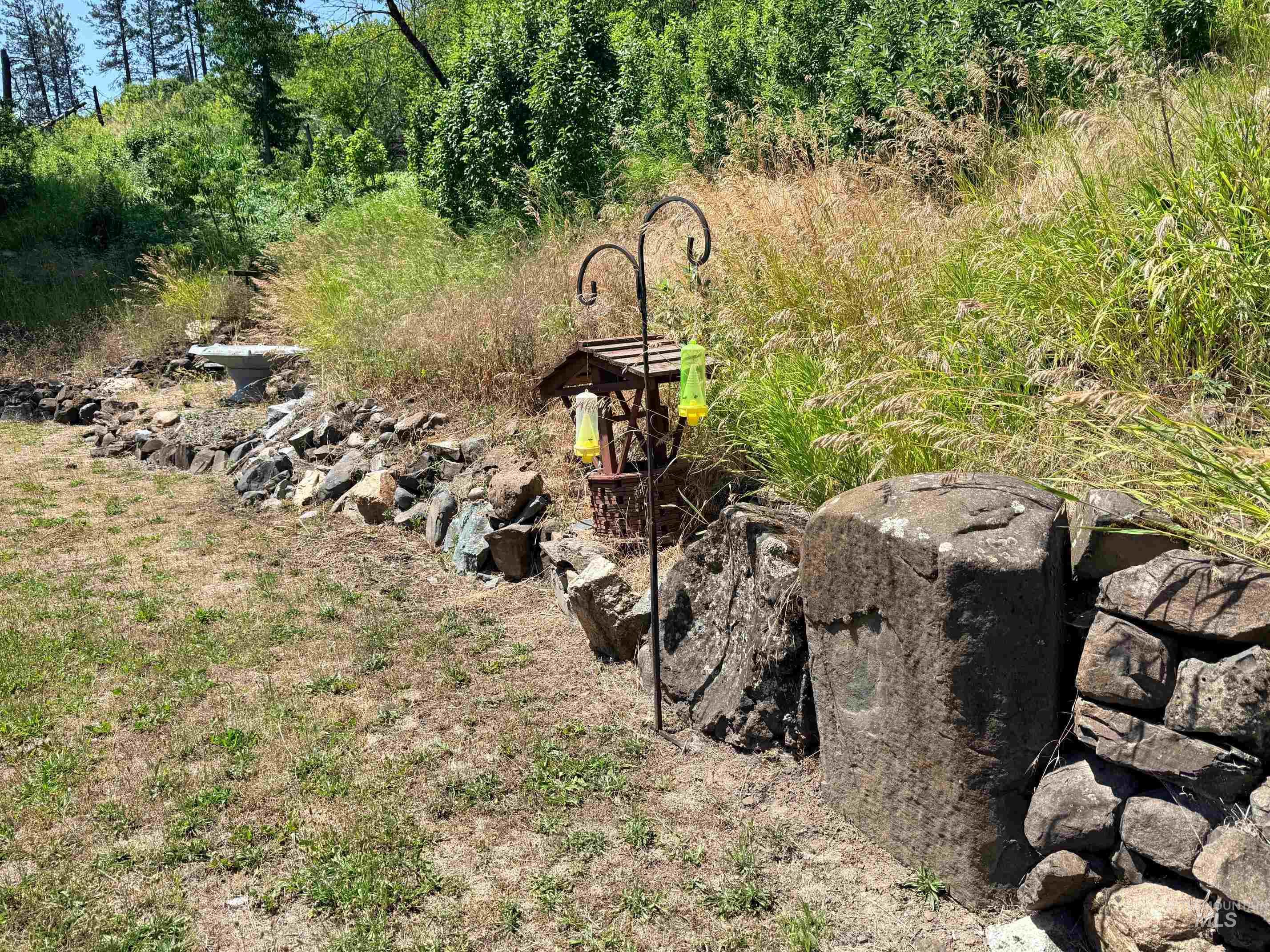 35322 River Road Lenore, ID 83541 - Photo 41 of 42 Stone retaining wall with a natural rock border