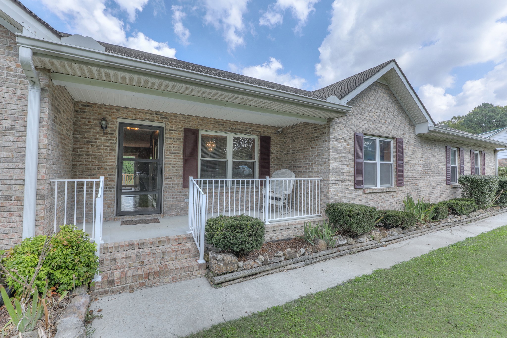 329 Shelton Road Manchester, TN 37355 - Photo 2 of 20 a front view of a house with garden