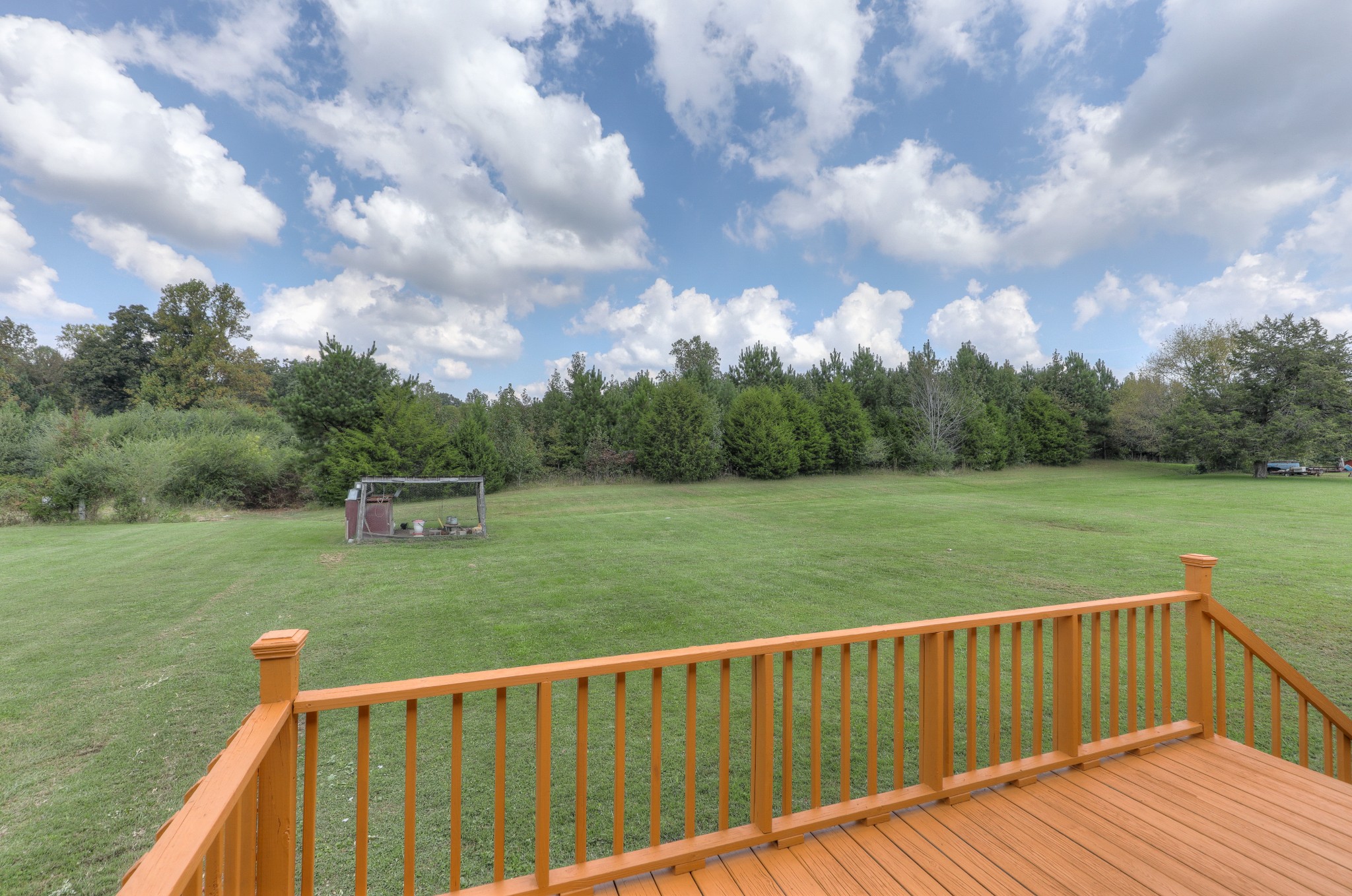329 Shelton Road Manchester, TN 37355 - Photo 18 of 20 a view of a deck with a big yard