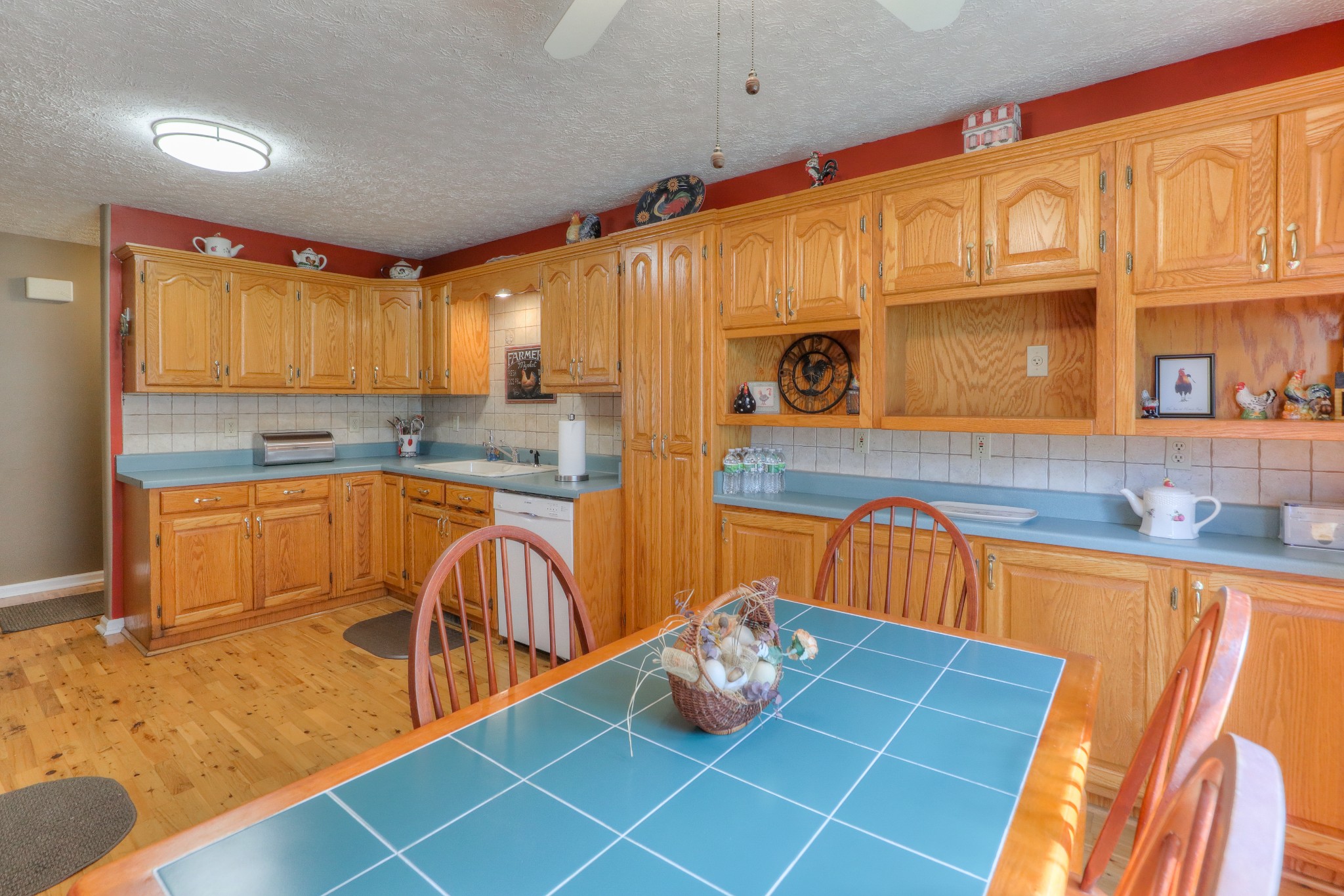 329 Shelton Road Manchester, TN 37355 - Photo 6 of 20 a kitchen with stainless steel appliances granite countertop a sink a stove and a microwave