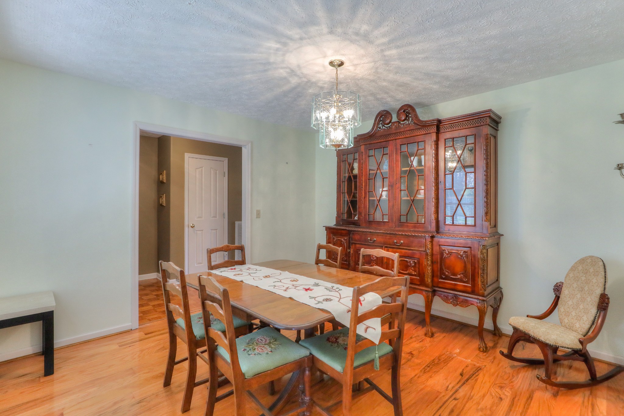 329 Shelton Road Manchester, TN 37355 - Photo 9 of 20 a view of a dining room with furniture and chandelier