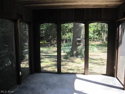 1129 Croyden Road Lyndhurst, OH 44124 - Photo 20 of 25 Relax and enjoy the back yard in your private screened-in porch.