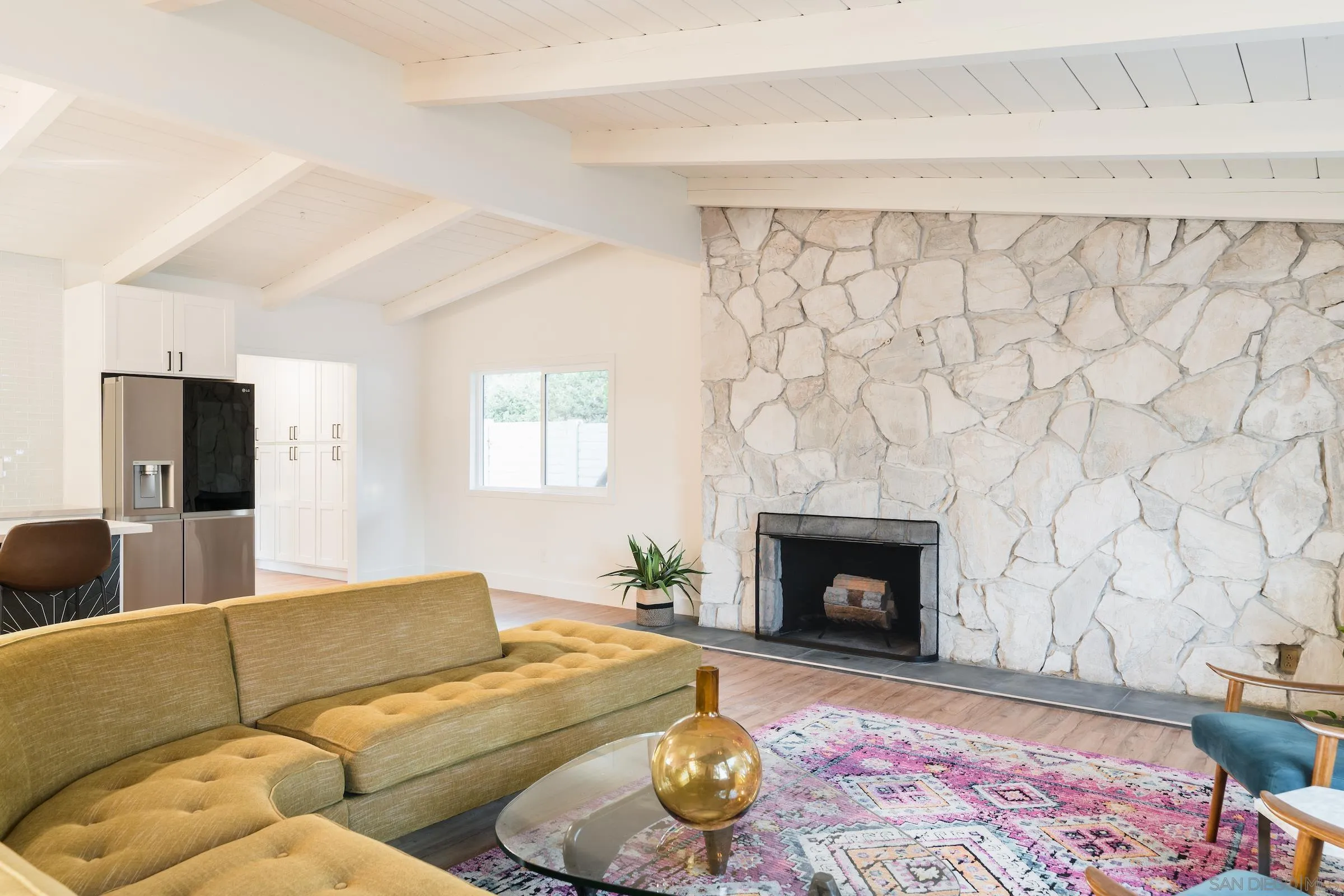 932 West Ranch Road San Marcos, CA 92078 - Photo 1 of 26 a living room with furniture and a fireplace