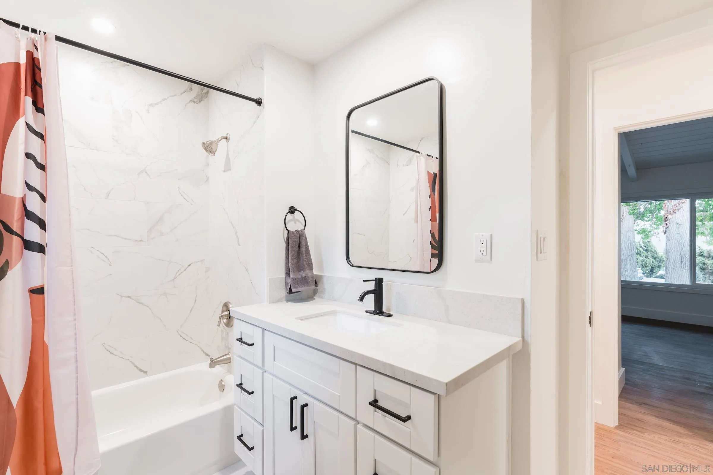 932 West Ranch Road San Marcos, CA 92078 - Photo 15 of 26 a bathroom with a sink and a mirror