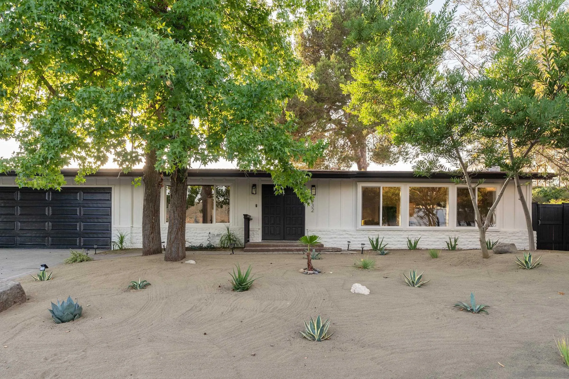 932 West Ranch Road San Marcos, CA 92078 - Photo 8 of 26 a front view of a house with a tree in it
