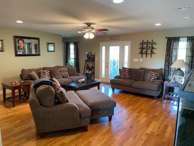 1328 Maddox Road Centerville, TN 37033 - Photo 3 of 47 a living room with furniture and wooden floor