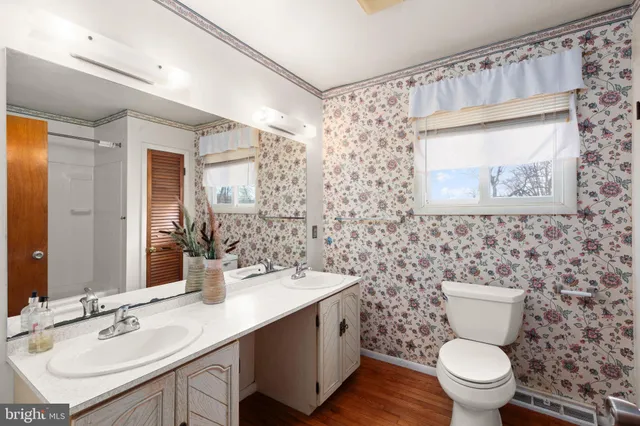 a kitchen with a sink and a refrigerator