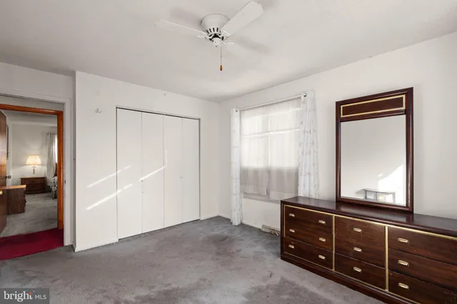 a view of a swimming pool with a yard