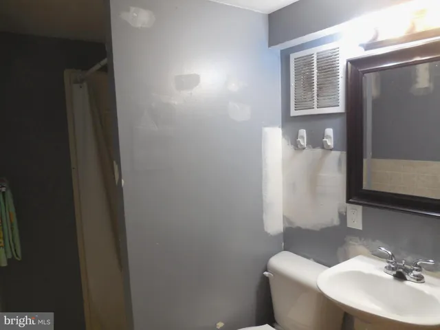 a view of empty room with windows