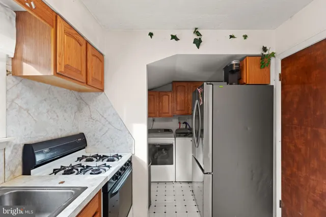 a room with a dresser and a mirror