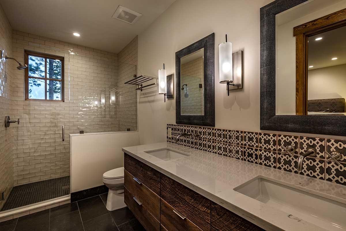 8249 Ehrman Drive Truckee, CA 96161 - Photo 17 of 21 a bathroom with a sink and a mirror