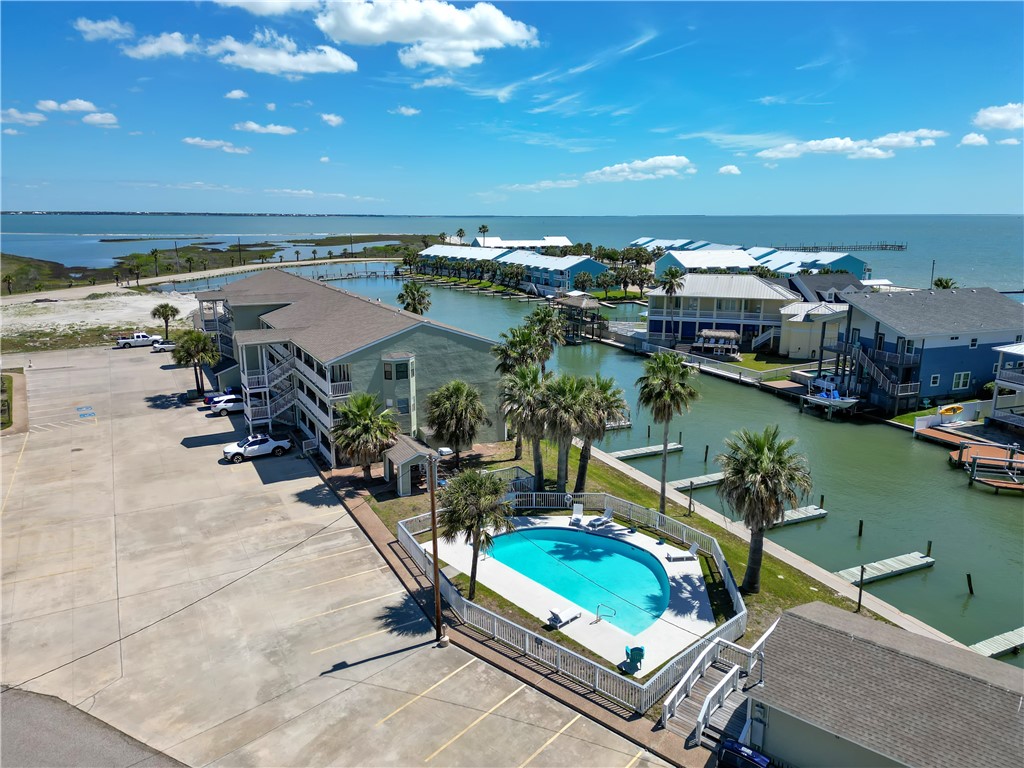 2290 North Fulton Beach Road, Unit 214 Rockport, TX 78382 - Photo 3 of 29 an outdoor space with boat and water view