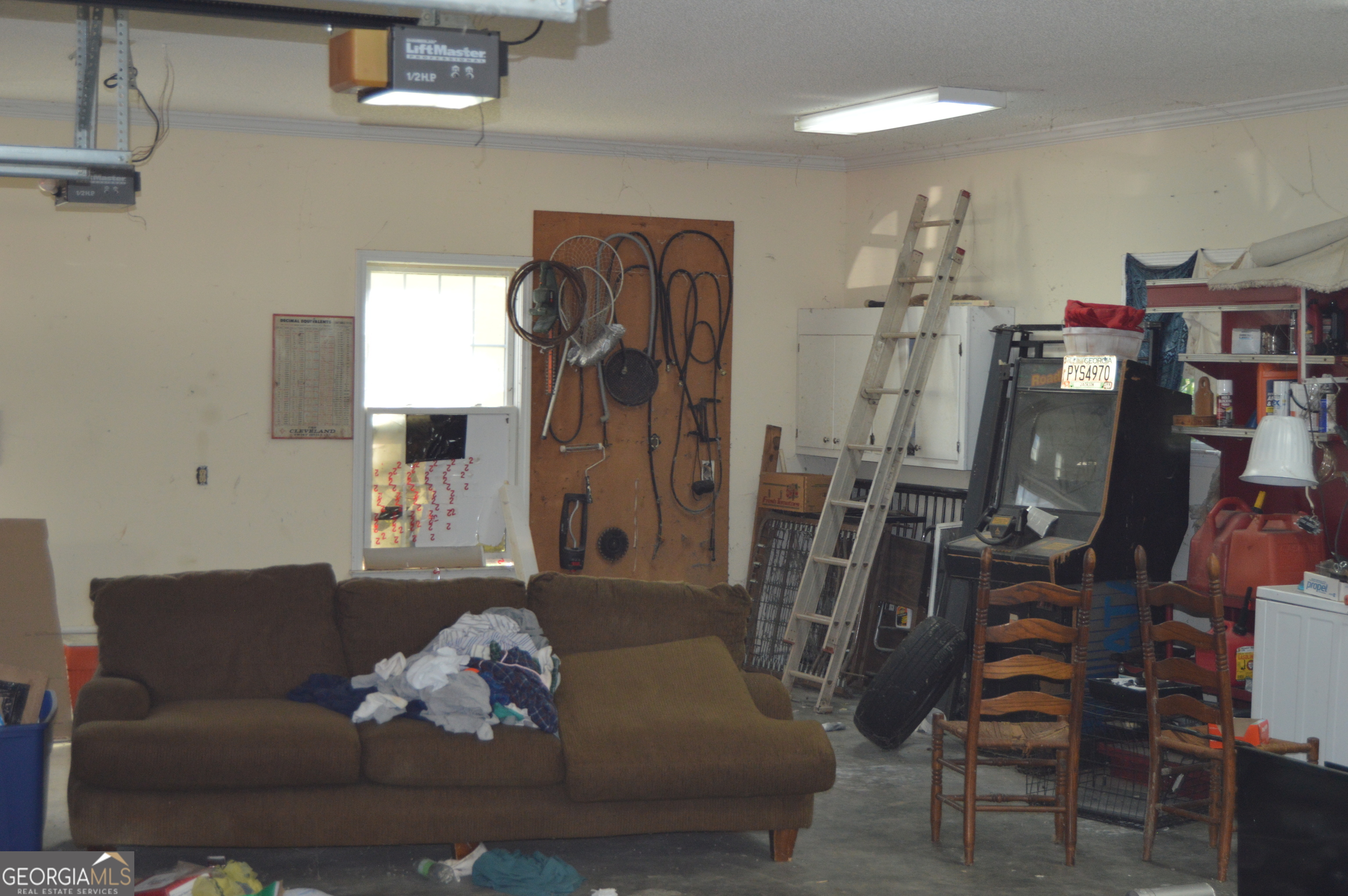 424 Law House Road Toccoa, GA 30577 - Photo 27 of 38 a living room with furniture and wooden floor