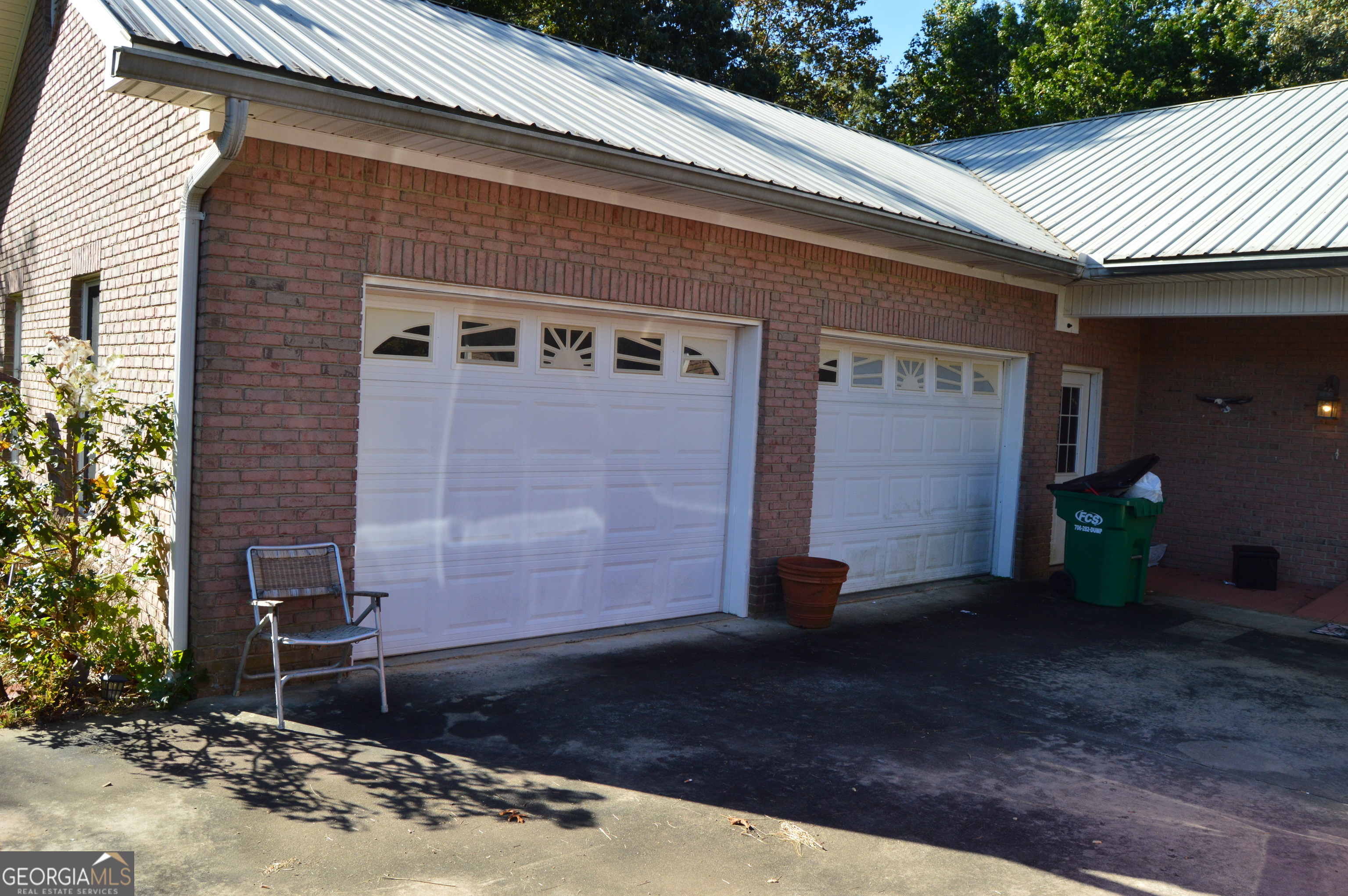 424 Law House Road Toccoa, GA 30577 - Photo 29 of 38 a backyard of a house with lots of green space