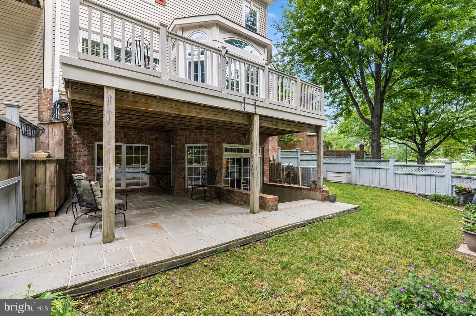 1925 Logan Manor Drive Reston, VA 20190 - Photo 39 of 61 a view of a house with backyard porch and sitting area