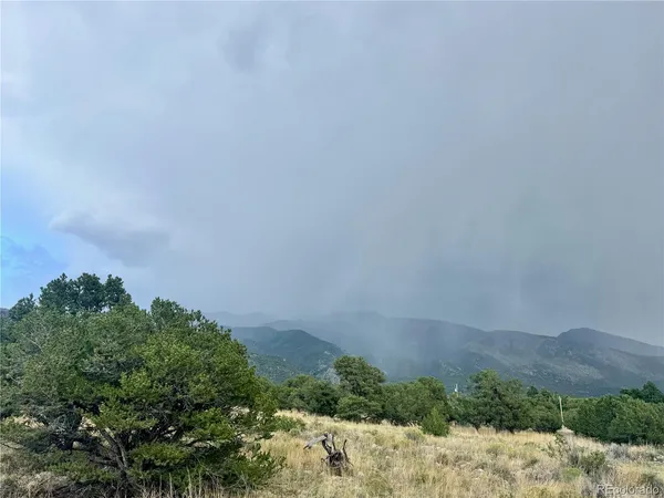 a view of mountains and valleys