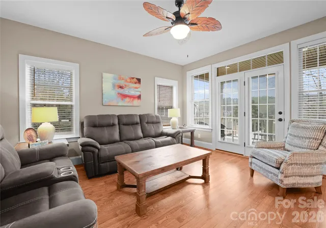 a view of balcony with wooden floor