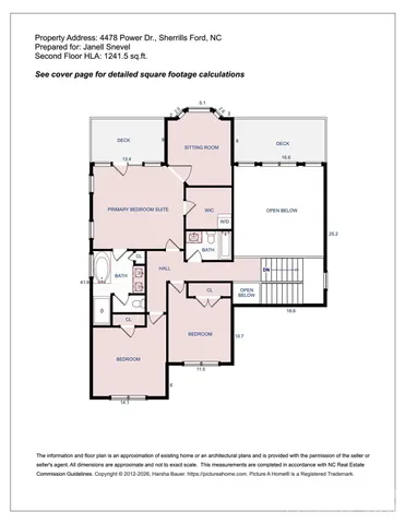 a view of a dining room with furniture a chandelier and wooden floor