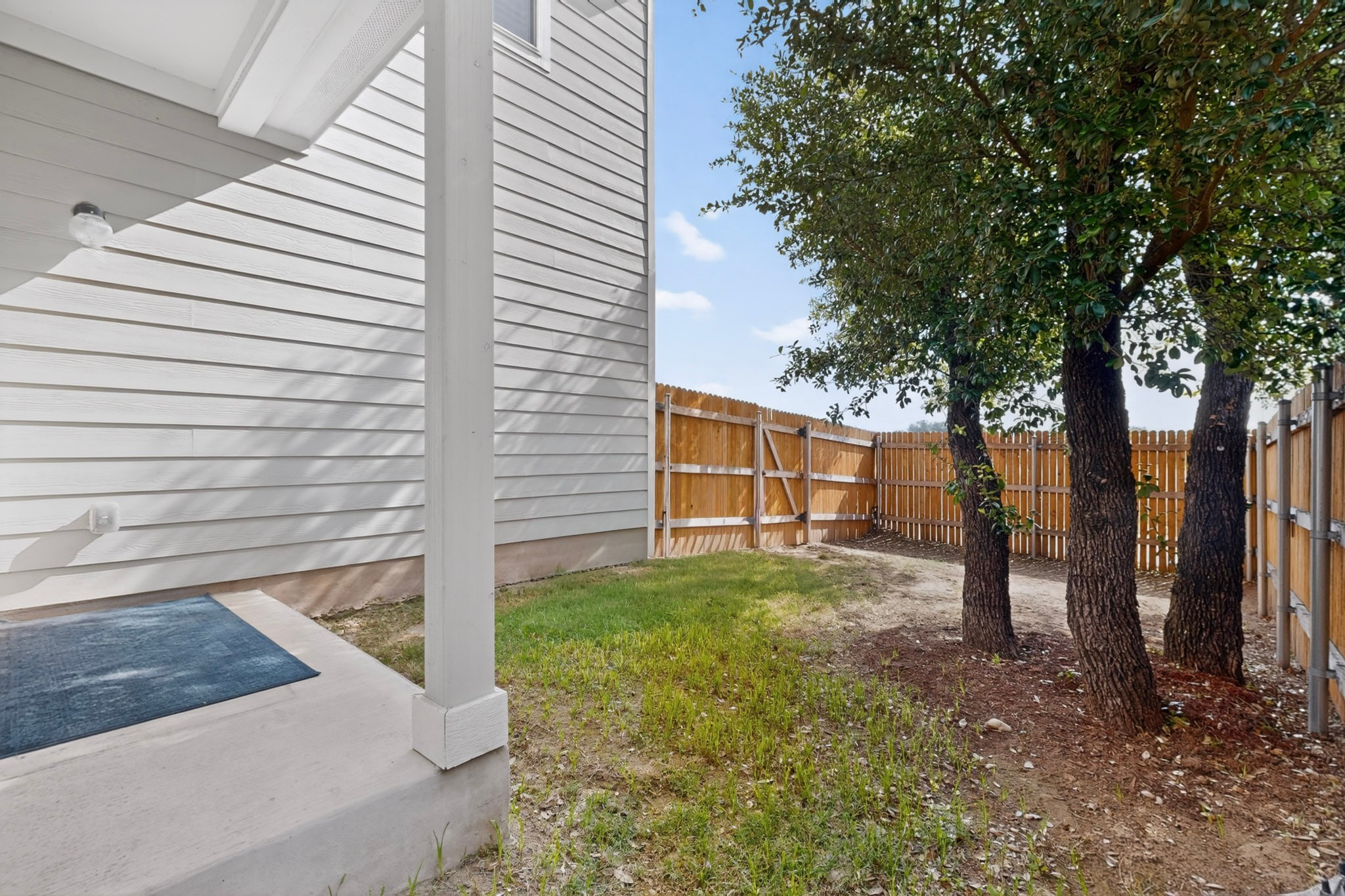 2524 Acoma Lane Leander, TX 78641 - Photo 25 of 27 a view of a backyard with large trees