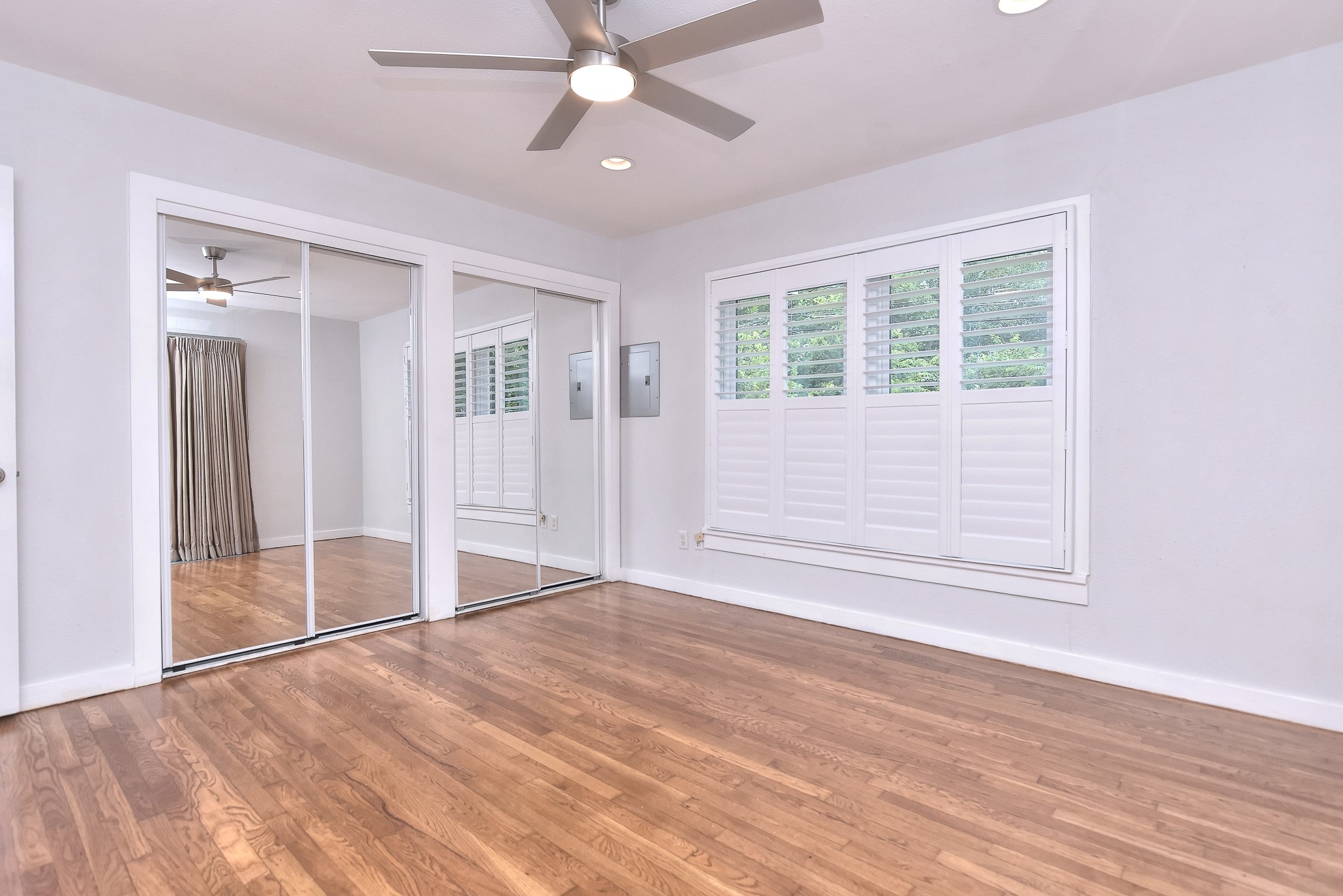 1309 Ridgemont Drive Austin, TX 78723 - Photo 19 of 35 Primary closet has custom shelving system offering great storage!