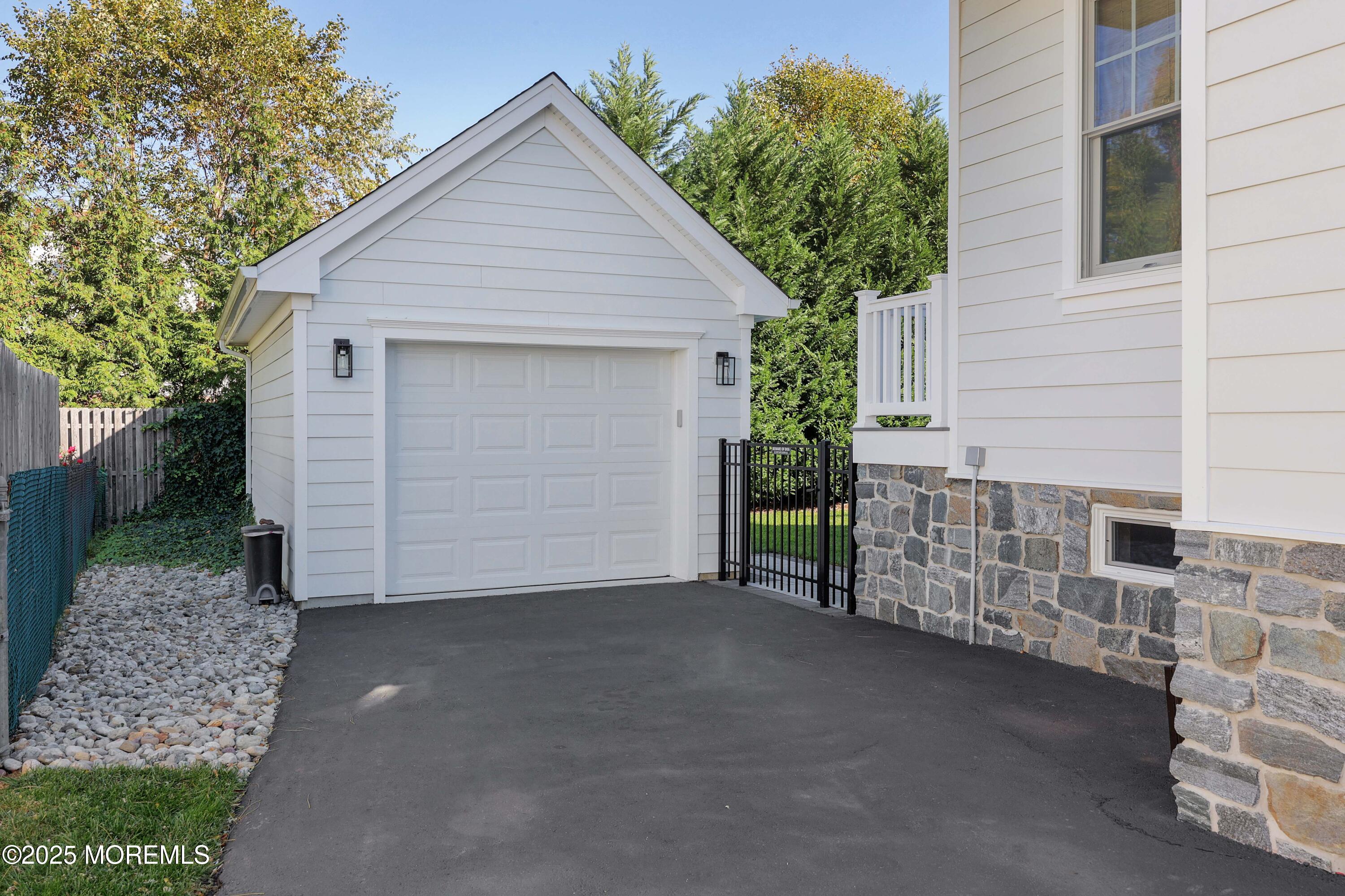 41 Forrest Avenue Rumson, NJ 07760 - Photo 27 of 32 a view of a house with a garage