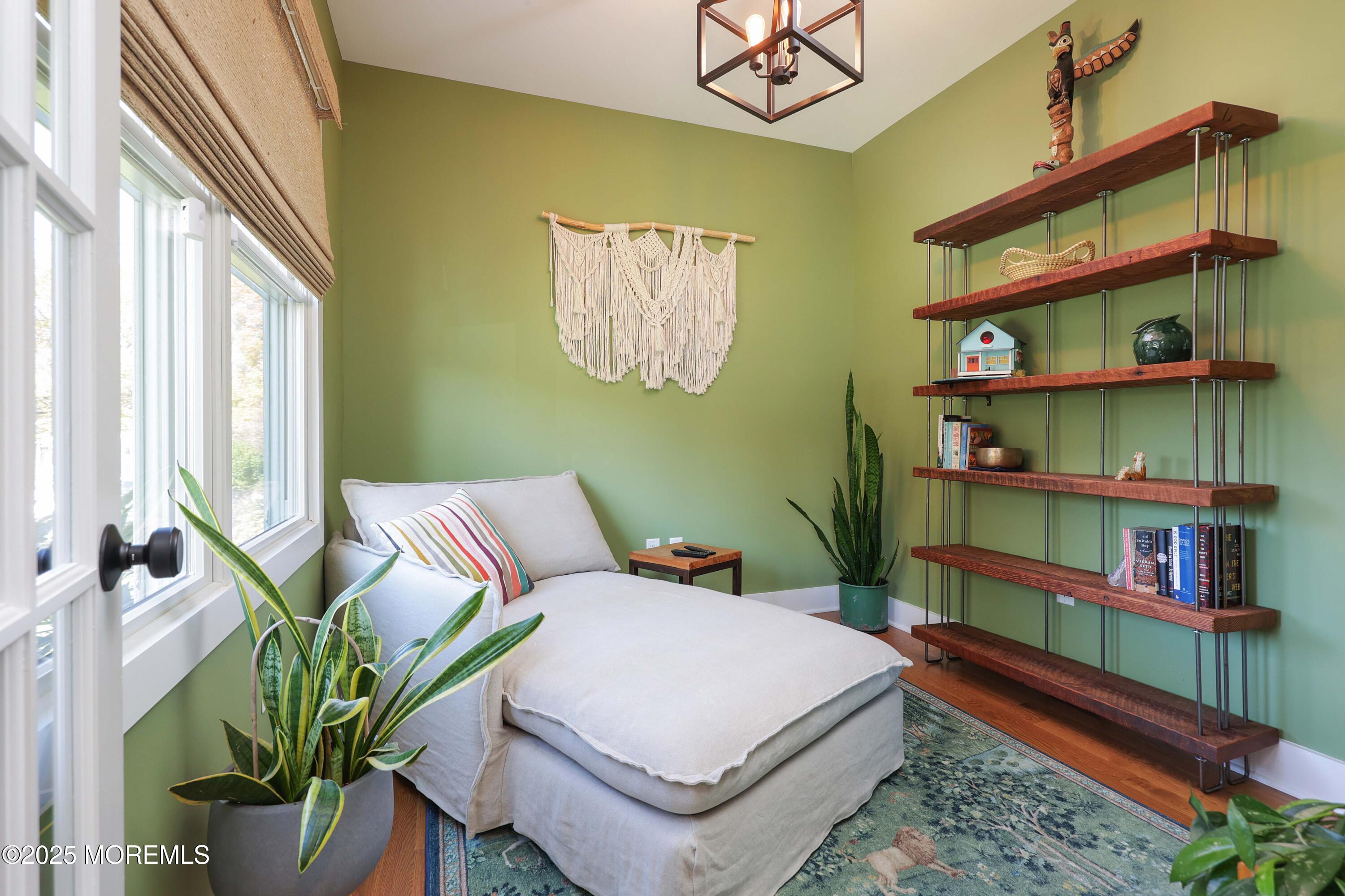 41 Forrest Avenue Rumson, NJ 07760 - Photo 10 of 32 a bedroom with bed and a book shelf