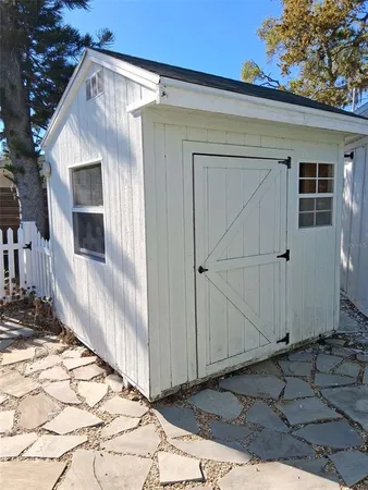 a view of a porch with seating space