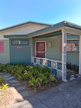 a view of front door and bedroom