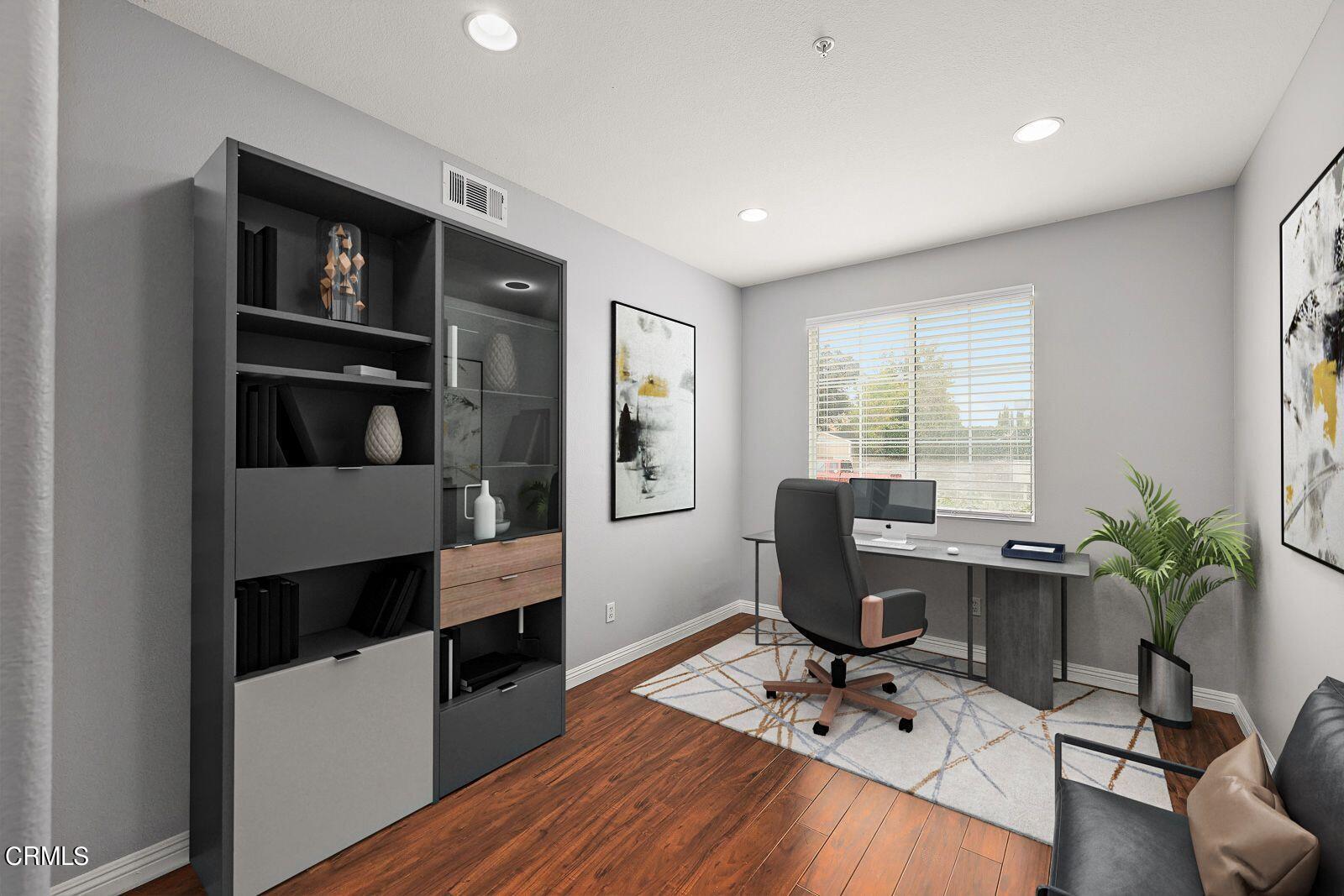 16740 Inverrary Way Fontana, CA 92336 - Photo 11 of 29 a view of a workspace with furniture and a window
