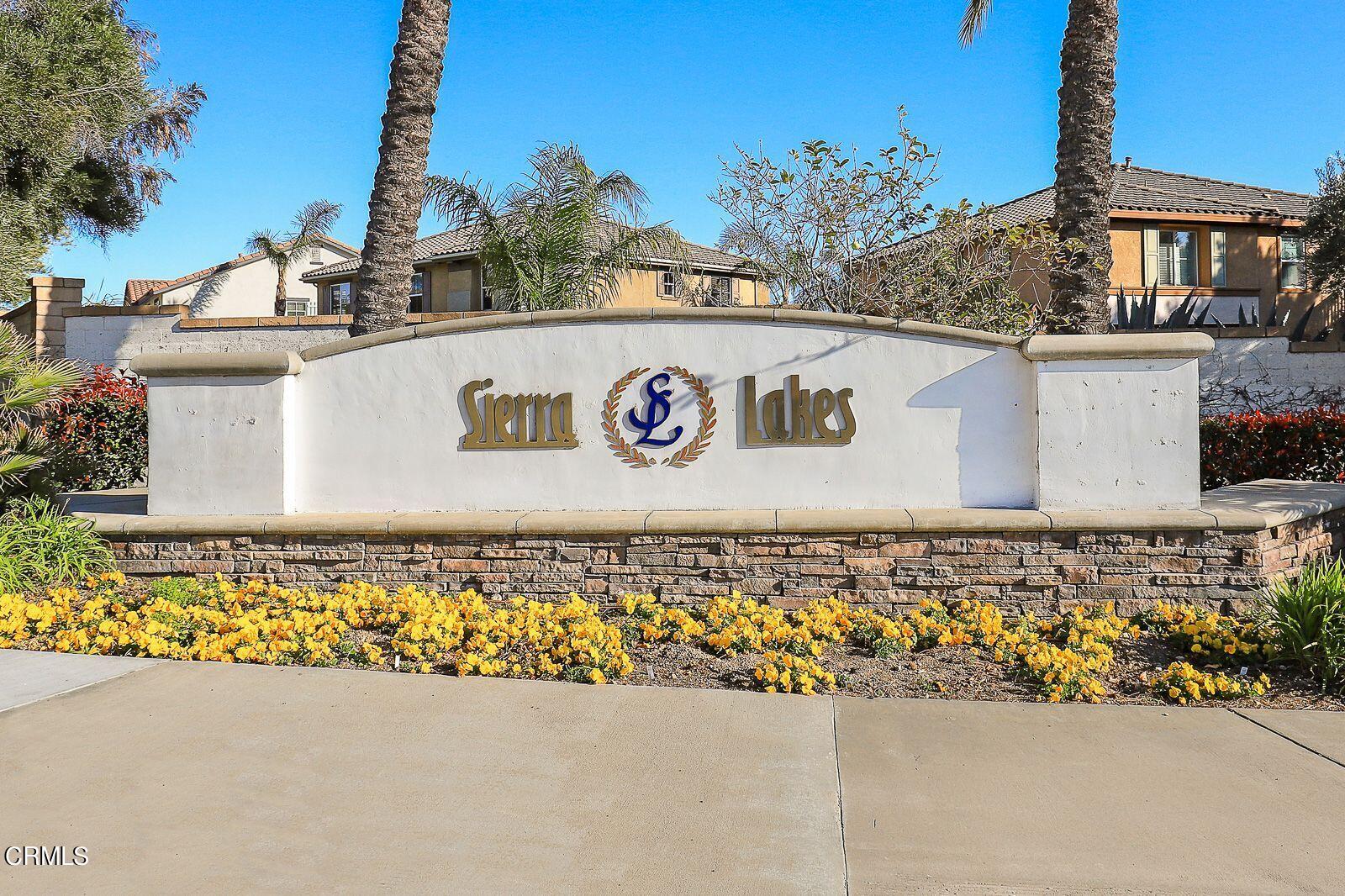16740 Inverrary Way Fontana, CA 92336 - Photo 28 of 29 a view of a sign board with buildings in the background