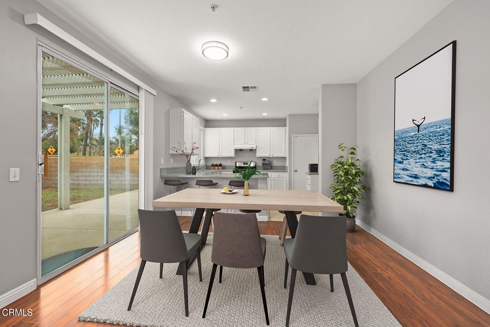 16740 Inverrary Way Fontana, CA 92336 - Photo 7 of 29 a view of a dining room with furniture window and outside view