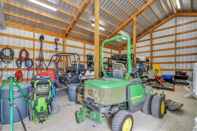 a room with lots of tables and chairs