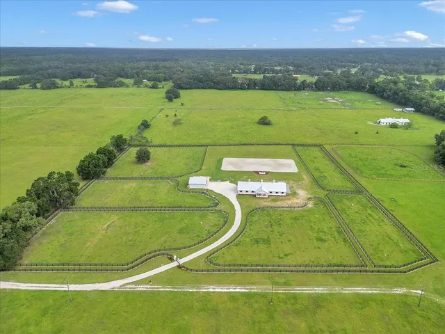 a bathroom with a shower and mirror