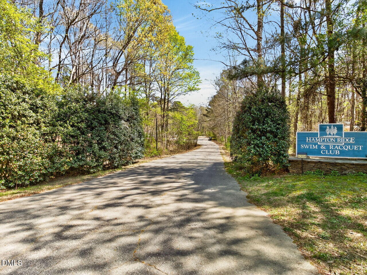 6104 Wolverhampton Drive Raleigh, NC 27603 - Photo 32 of 35 a view of a yard with plants and trees