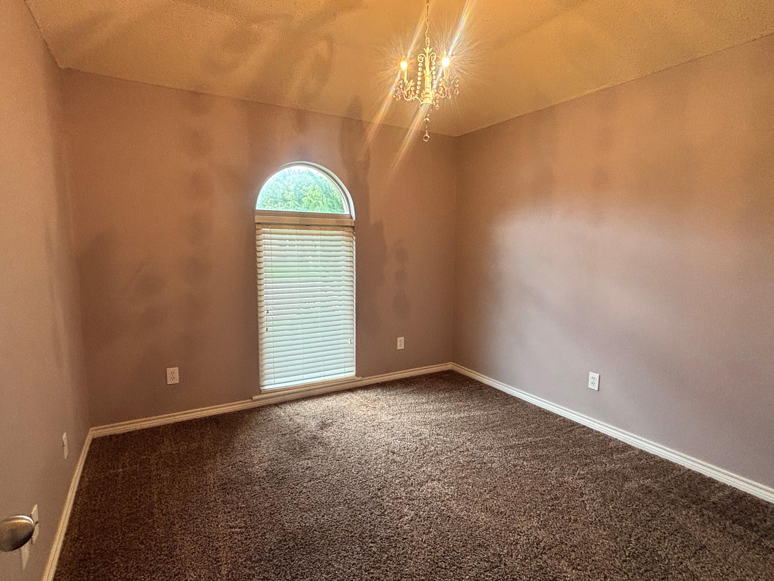 3713 106th Street Lubbock, TX 79423 - Photo 14 of 22 a view of a window in a room