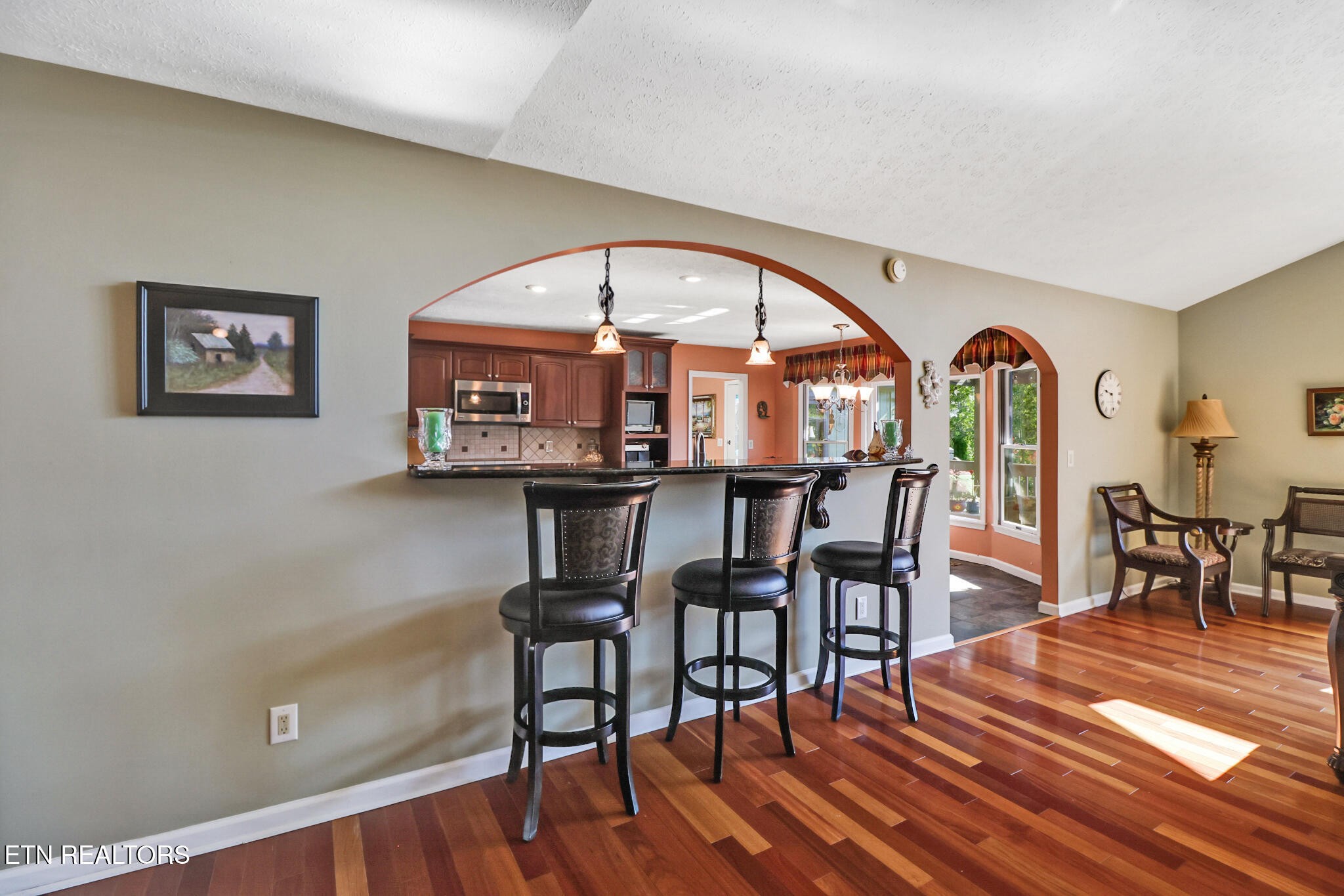 16 Victoria Way Crossville, TN 38558 - Photo 15 of 60 a view of a dining room with furniture window and wooden floor
