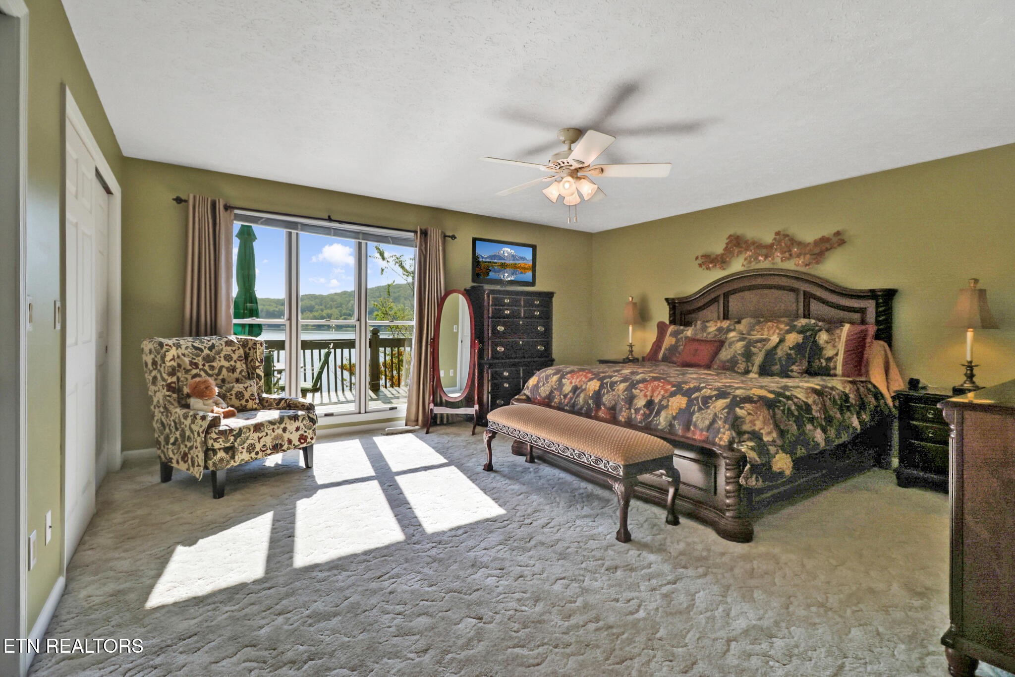16 Victoria Way Crossville, TN 38558 - Photo 21 of 60 a bedroom with a large bed couch and a window