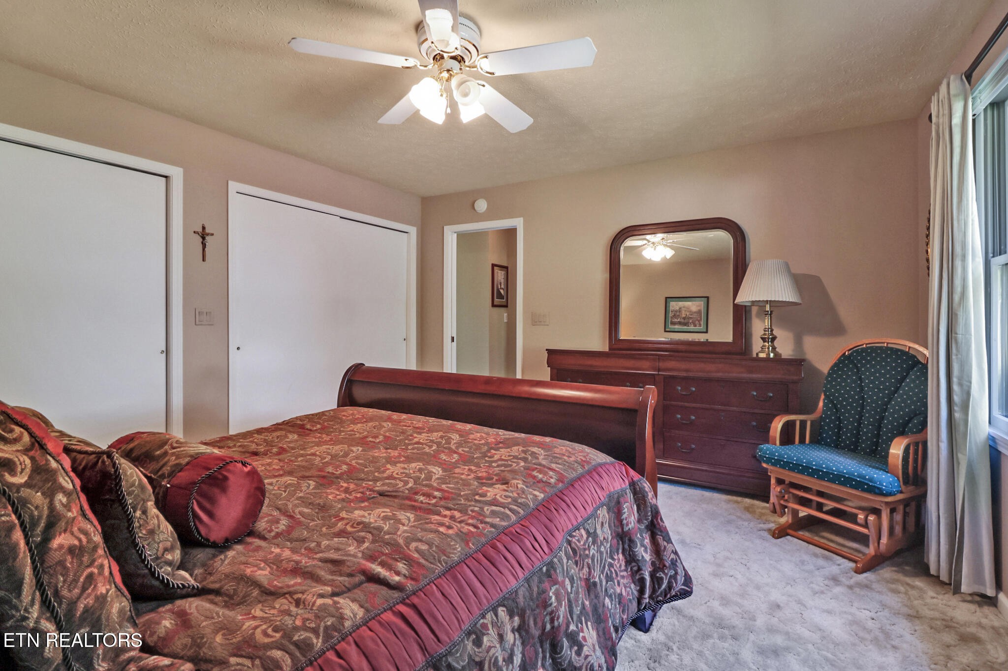 16 Victoria Way Crossville, TN 38558 - Photo 26 of 60 a bedroom with a bed dresser and a chair