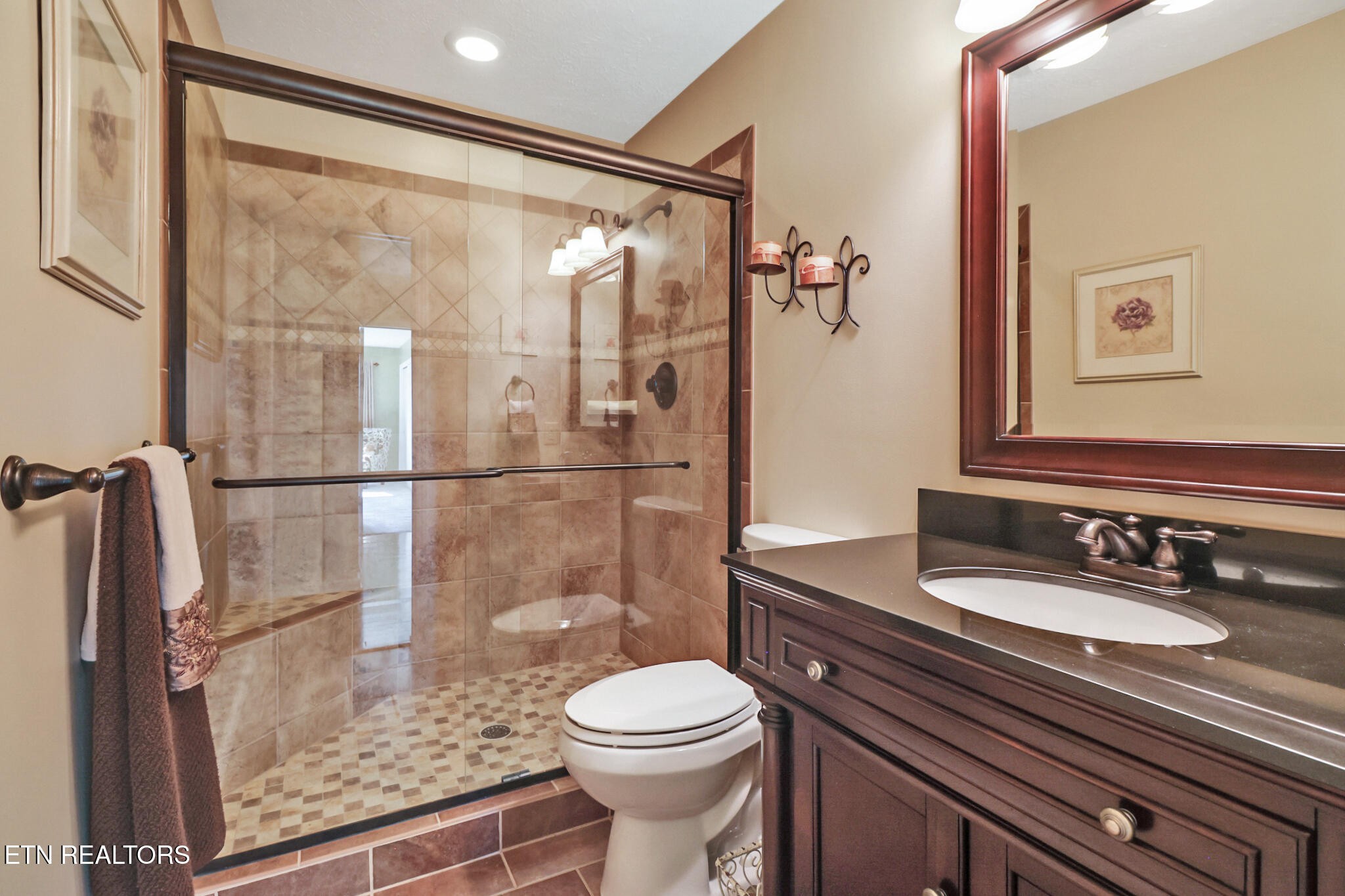 16 Victoria Way Crossville, TN 38558 - Photo 29 of 60 a bathroom with a sink a toilet and shower