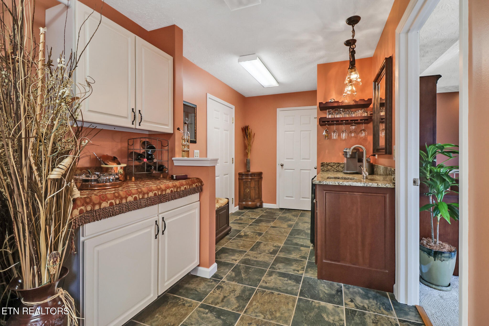 16 Victoria Way Crossville, TN 38558 - Photo 32 of 60 a kitchen with stainless steel appliances granite countertop a refrigerator and a stove