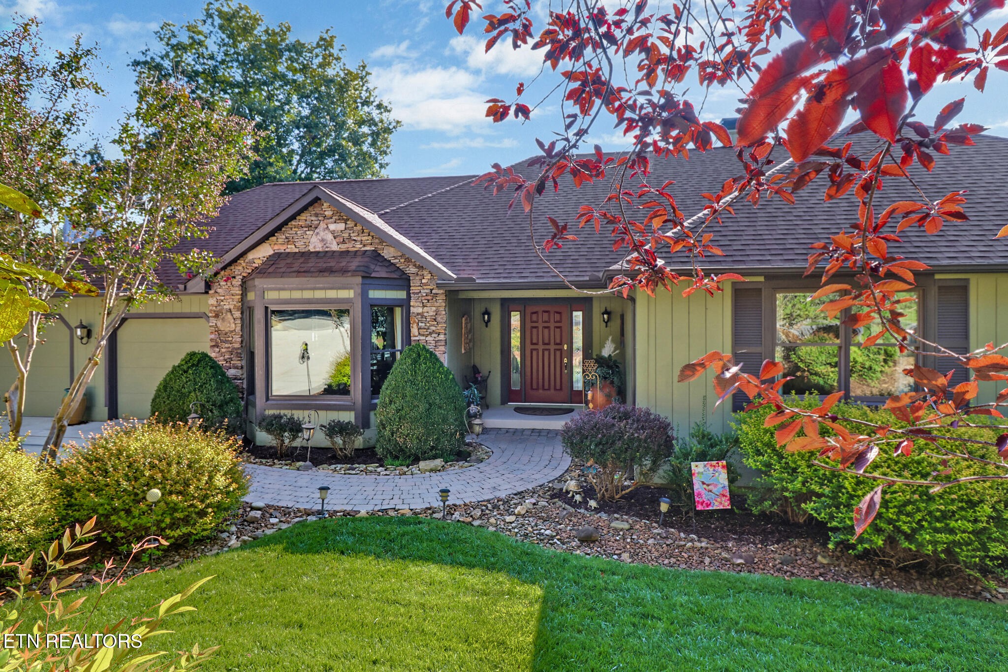 16 Victoria Way Crossville, TN 38558 - Photo 6 of 60 a front view of a house with garden