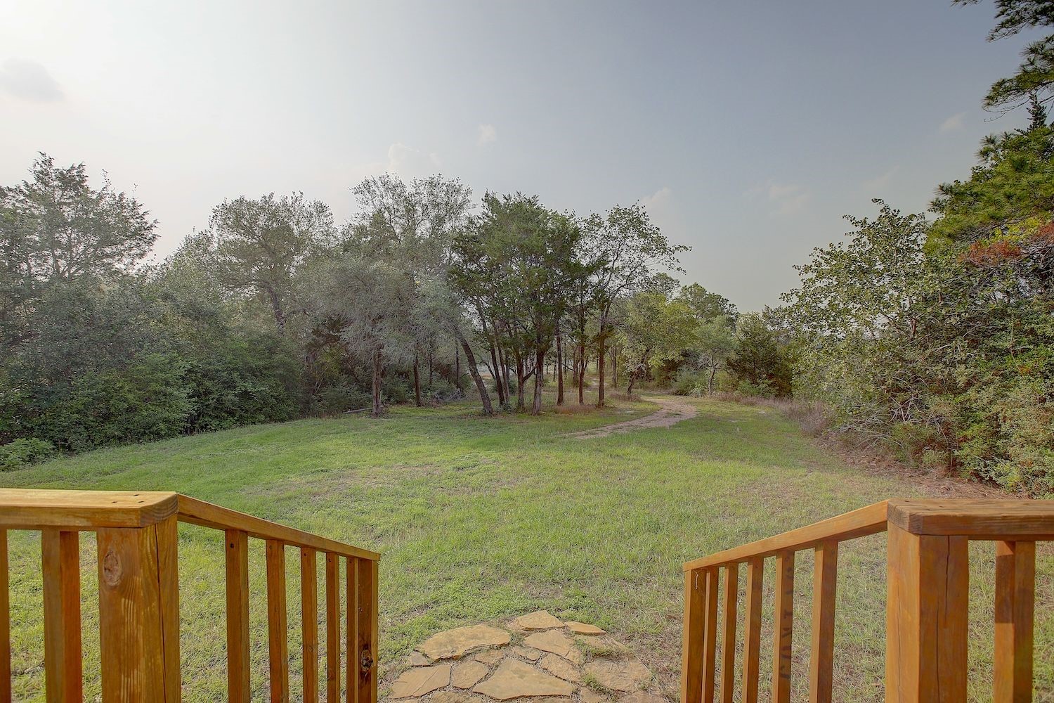 4540 Creamer Creek Road La Grange, TX 78945 - Photo 12 of 32 View of the deck exit area, ready to take a walk on the back portion of the property? Dreaming of the huge custom home you are able to build?