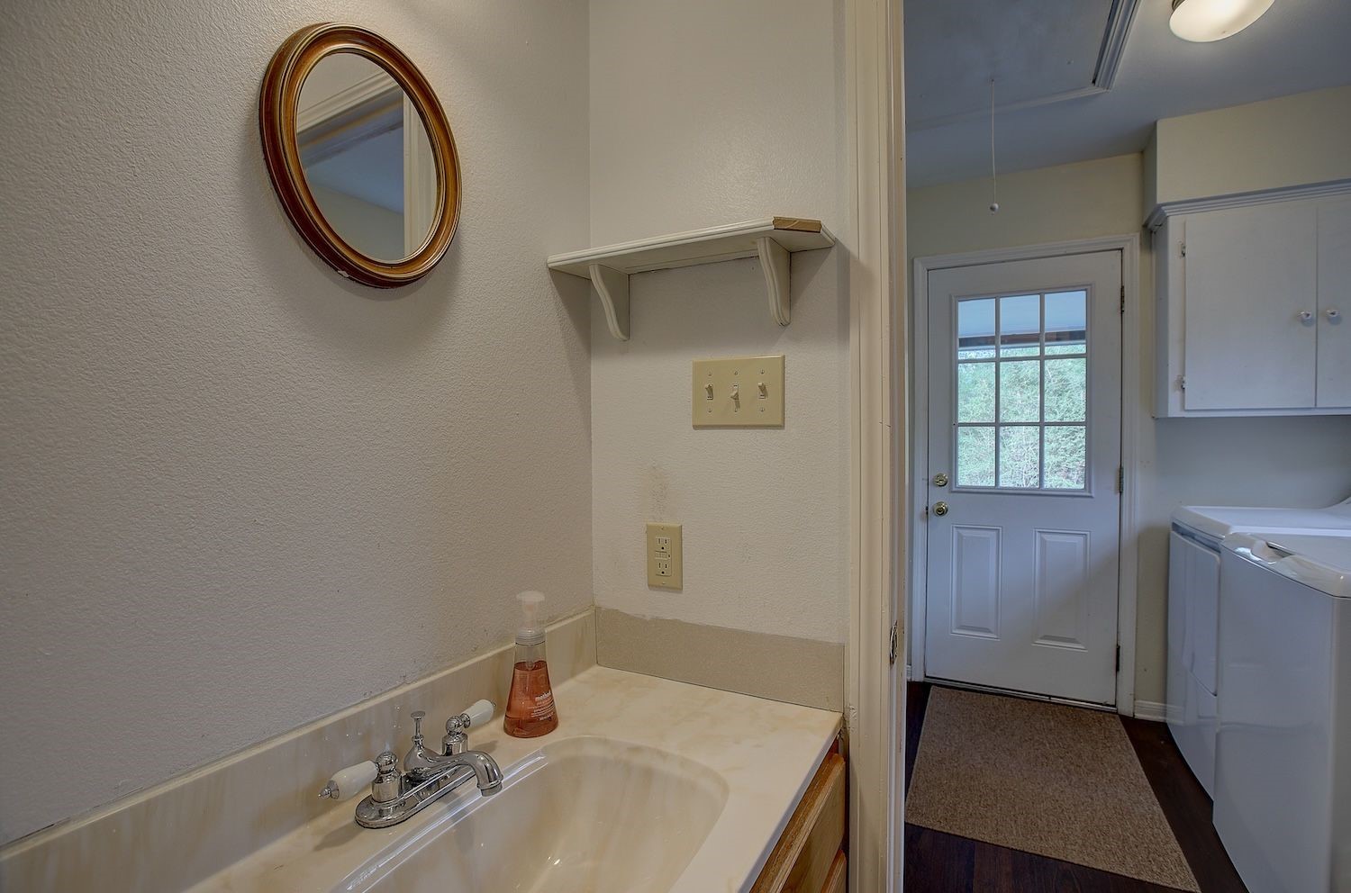 4540 Creamer Creek Road La Grange, TX 78945 - Photo 19 of 32 Second bathroom vanity with a shower only and next door to the utility/mud room
