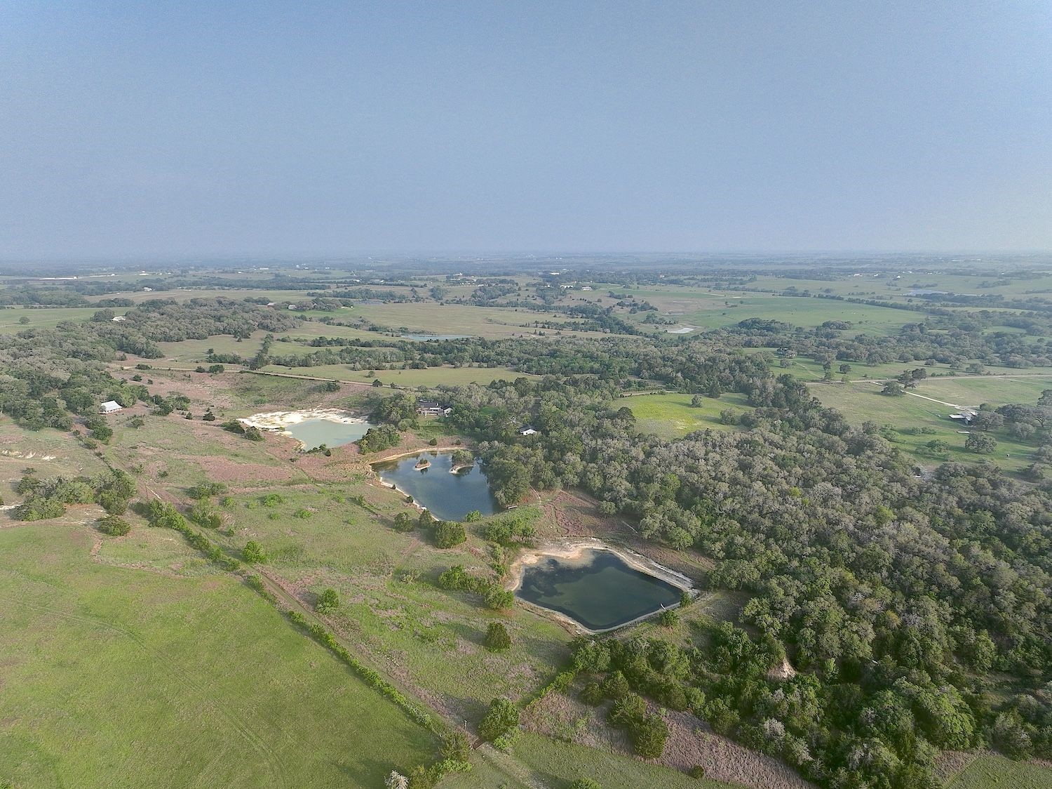4540 Creamer Creek Road La Grange, TX 78945 - Photo 29 of 32 Distant aerial of the property views and beyond.