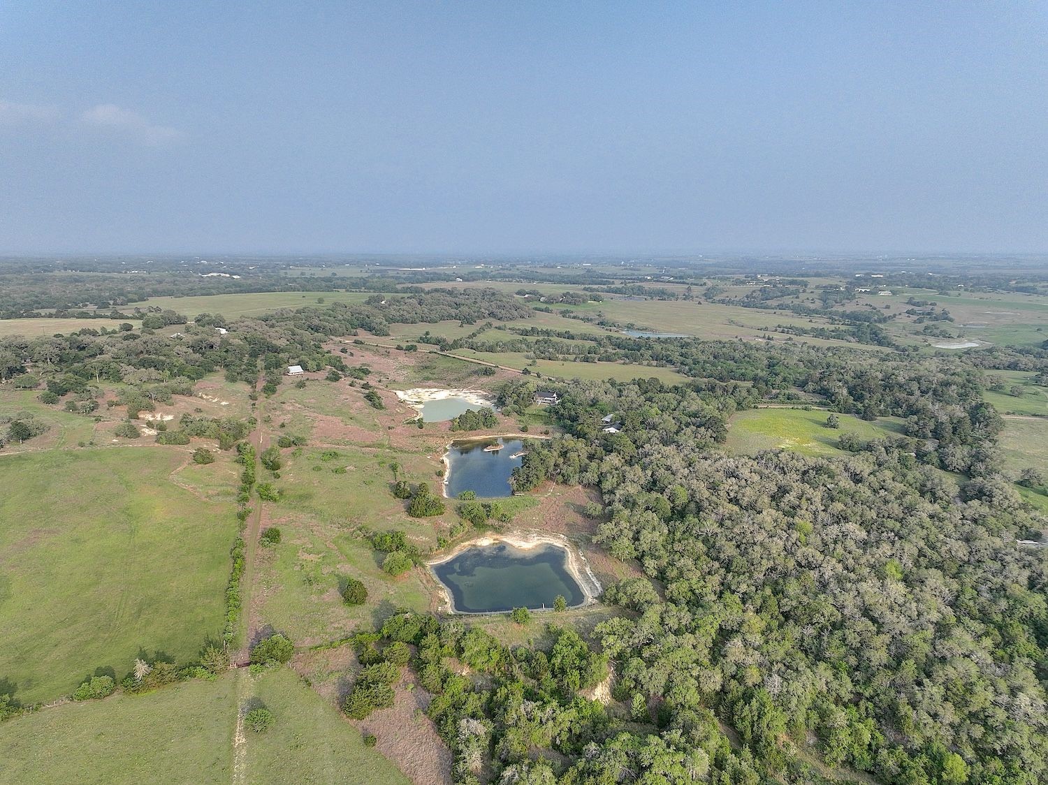 4540 Creamer Creek Road La Grange, TX 78945 - Photo 30 of 32 Another aerial of distant views.