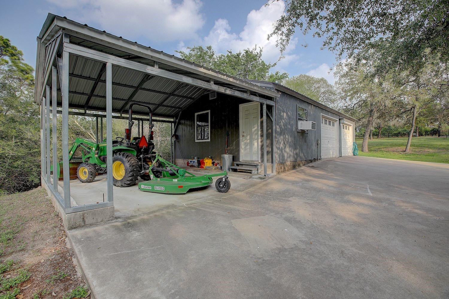 4540 Creamer Creek Road La Grange, TX 78945 - Photo 9 of 32 View of the garage/carport/lean-to with workshop/studio area to boot!
