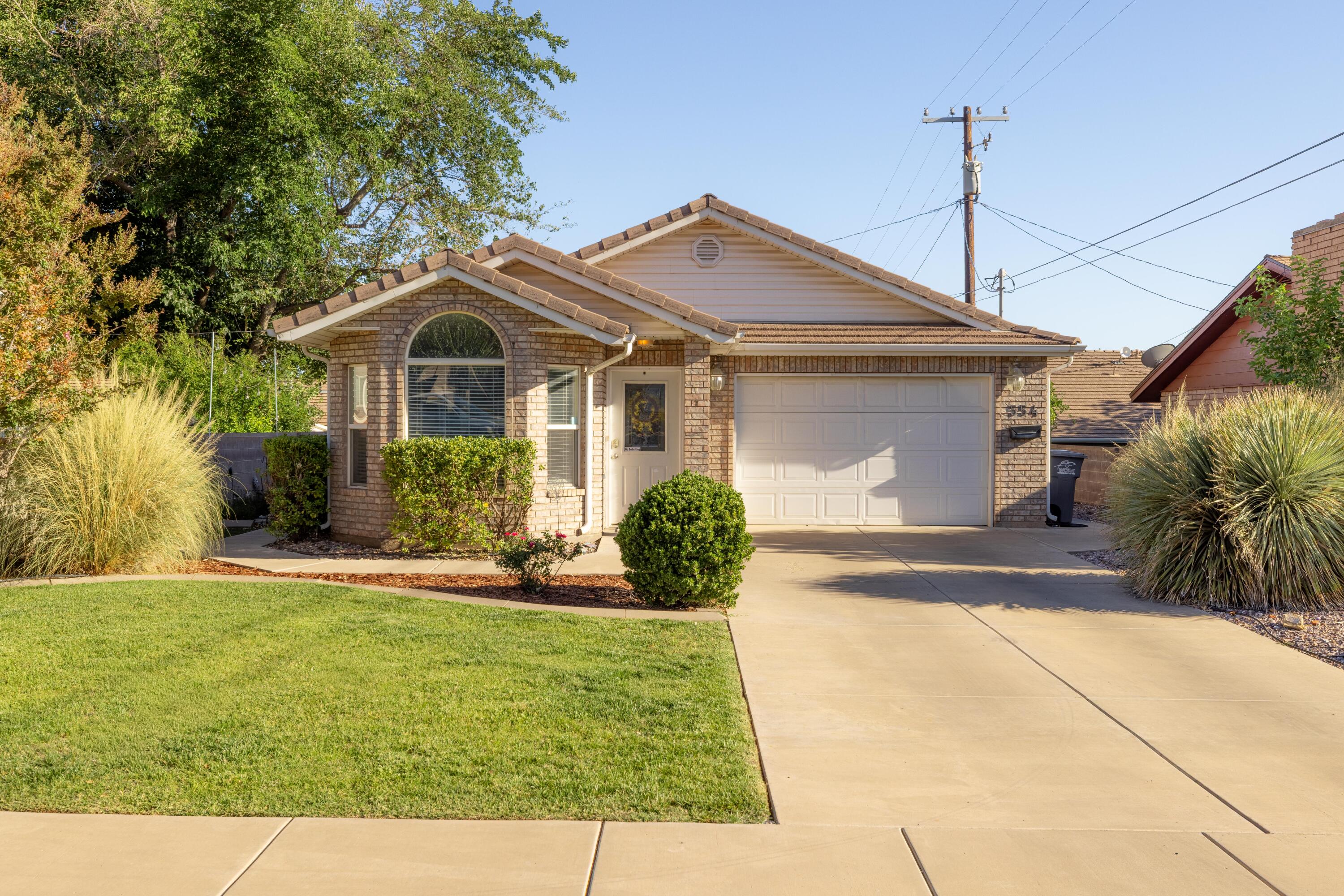554 East 200 South, Unit 10 St. George, UT 84770 - Photo 1 of 21 Front of home, single car garage