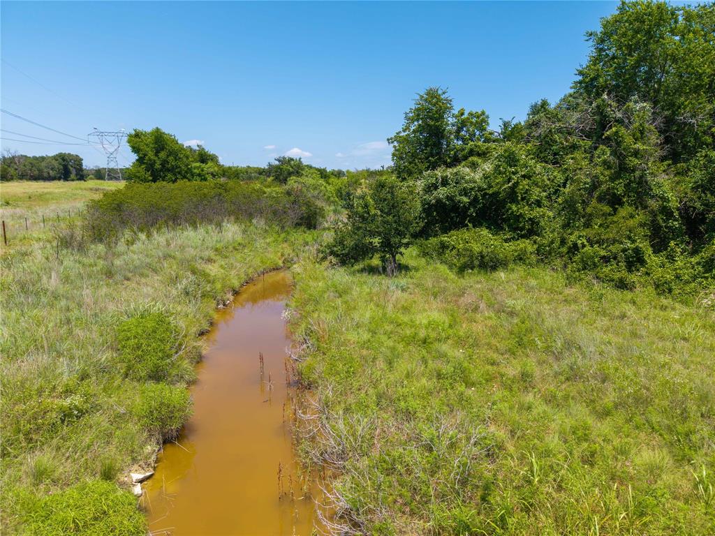 3885 County Road 522 Dublin, TX 76446 - Photo 27 of 30 a view of a lake with a yard