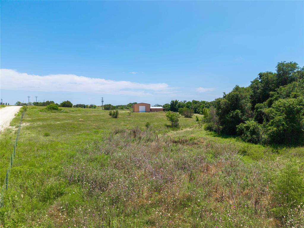 3885 County Road 522 Dublin, TX 76446 - Photo 8 of 30 a view of a big yard with large trees