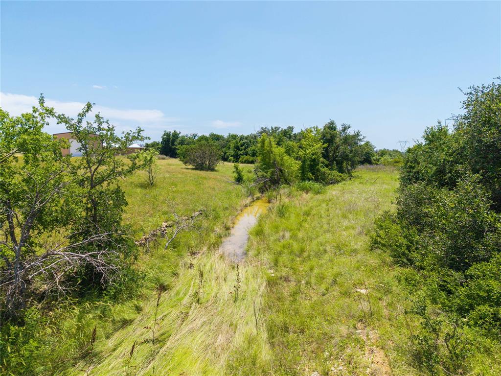 3885 County Road 522 Dublin, TX 76446 - Photo 9 of 30 a view of a lake with a house